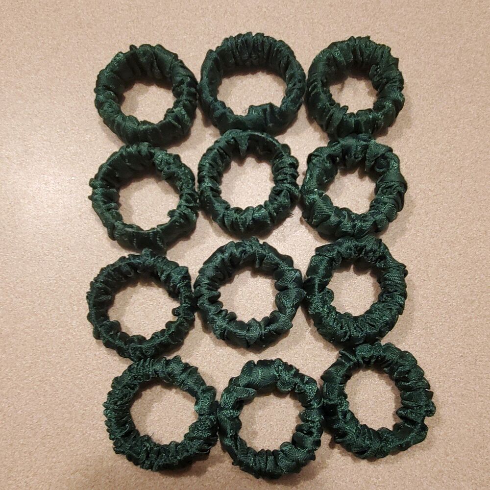 Vintage fabric over plastic Rings napkin rings.12 count.